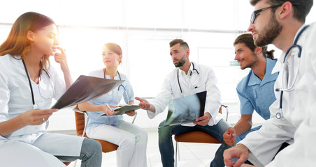 Fototapeta premium medical staff discussing x-ray of a patient