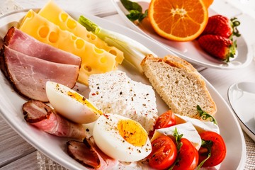 English breakfast on wooden table