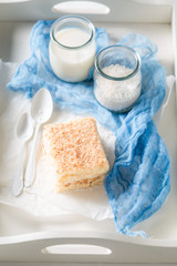 Delicious coconut cake with nuts and foam