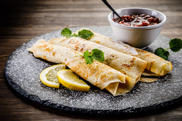 Crepes with strawberries and cream