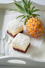 Homemade white cake with pineapple and brown bottom