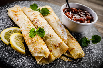 Crepes with strawberries and cream