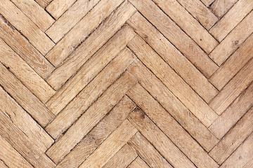 Texture of an old parquet board closeup