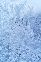 Frosty pattern on the glass window. Abstract, background, texture