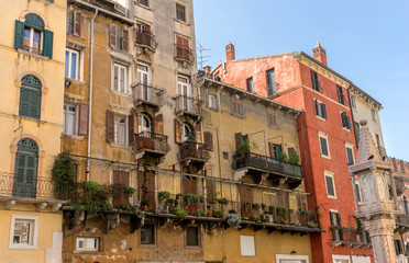 Fototapeta na wymiar Piazza Erbe in Verona / Buildings in Piazza Erbe in Verona in Italy