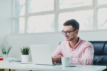 Young man in office