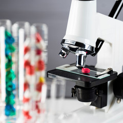 Laboratory Microscope. Scientific and healthcare research background.. drug tests tubes