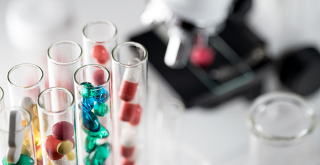Laboratory Microscope. Scientific and healthcare research background.. drug tests tubes