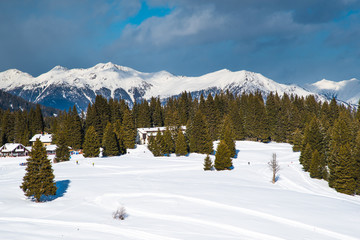 Fototapeta na wymiar Snowy landscape in the Italian Alps
