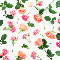 Obraz na płótnie Canvas Floral pattern with roses, buds and green leaves on white background. Flat lay, top view. Spring background