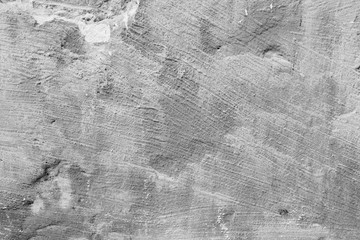 Wall fragment with scratches and cracks