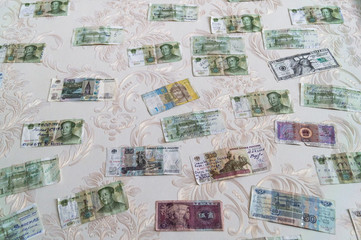 Money on the wall. Gratitude of visitors