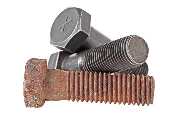 Metal bolts on a white background - old and new