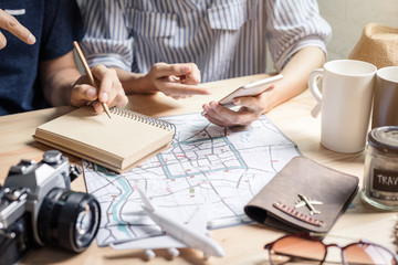 Young couple planning vacation trip