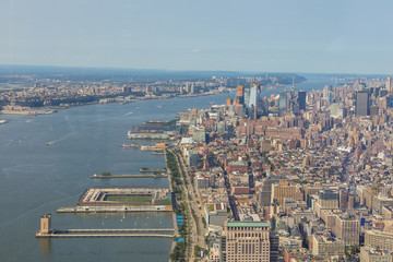 Fototapeta premium Aerial view of Manhattan skyline on a sunny summer day.