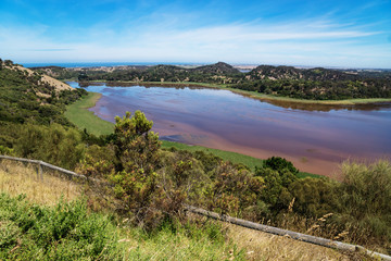 Panoramic view on coloured lake surrounded by trees. Tower Hill Wildlife reserve park. Victoria, Australia