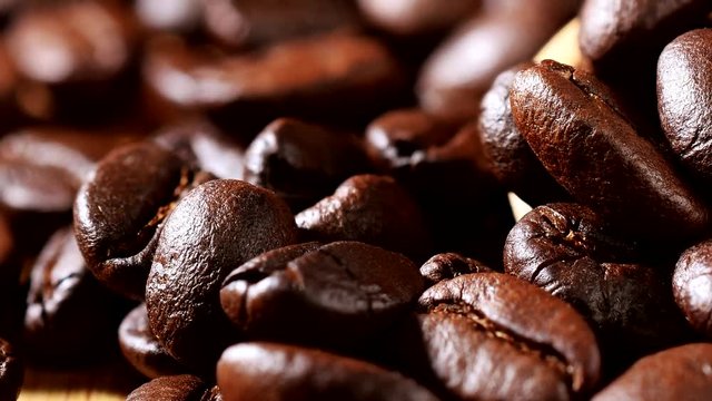 Coffee beans close-up, cam moves to the left