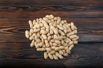 peanuts on wood background