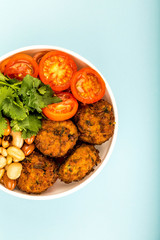 Bowl Of Falafel Beans Coriander And Tomatoes