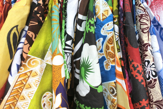 Tropical men shirts on display in Rarotonga market Cook Islands