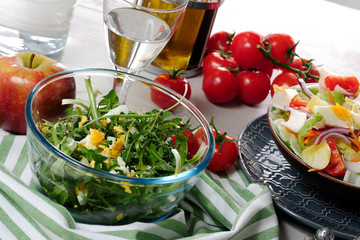 dandelion salad in a glass bowl