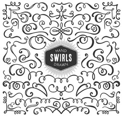 Hand drawn decorative curls and swirls collection. Vintage vector design elements. Ink illustration.