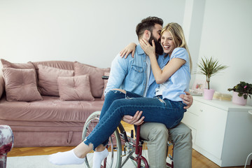 Handicapped man and his wife