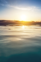 Obraz premium Outdoor swimming pool in sunset