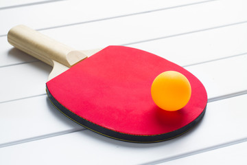 Ping-pong table tennis on white wooden background top view