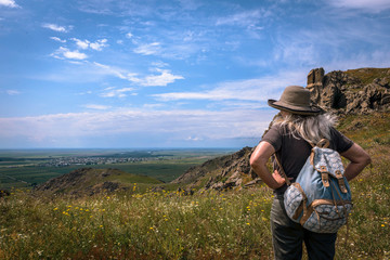 sky view from the mountains with woman