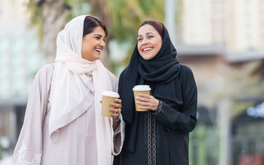 Two arabian girlfriends bonding and having fun