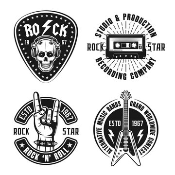 Set of four rock n roll music vector emblems, labels, badges and logos in vintage style on white