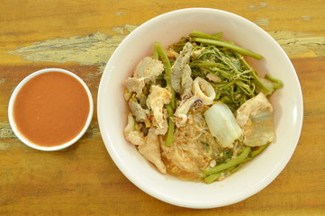 boiled seafood sukiyaki in soup with sauce