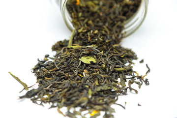 green tea leaves on white background