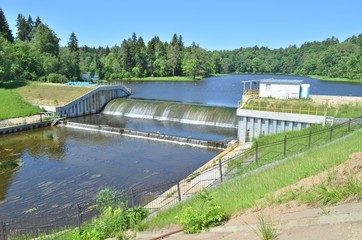 Fototapeta na wymiar The small dam on a river