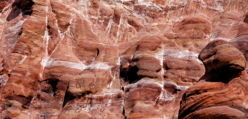 Laminated sandstone in Petra, Jordan, with strong red, yellow, orange and brown colours