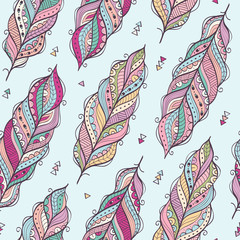 Vector seamless pattern with ethnic feathers. Colorful ethnic background.