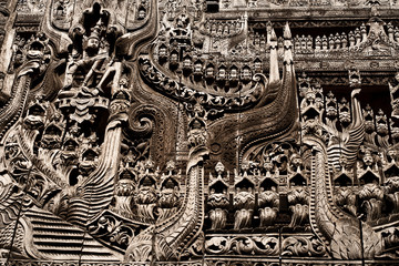 Mandalay, Myanmar - November 24, 2015 : .Very nice details of a old temple with wood in Mandalay