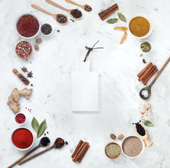 spices on a white marble background