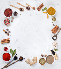 spices on a white marble background