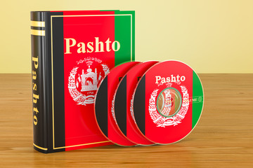 Pashto book with flag of Afghanistan and CD discs on the wooden table. 3D rendering