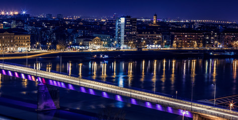 Fototapeta premium Panorama skyline and river at night-urban city.