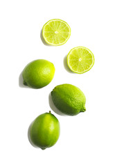 Fresh limes isolated on white background