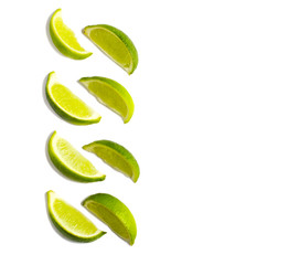 Fresh limes slices isolated on white background
