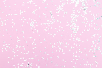 Pink background with sparkles. Abstraction