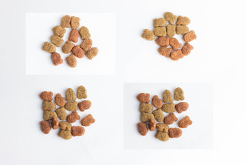 dry cat food in granules on a white background