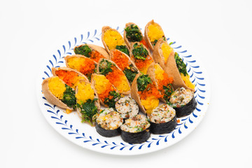 Sushi and gimbap on a plate isolated 