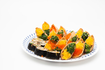 Sushi and gimbap on a plate isolated 