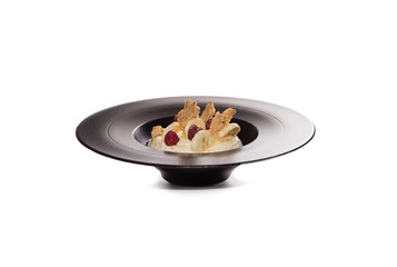cheesecake in plate whit strawberries,crispy bananas  and biscuits isolated on white background
