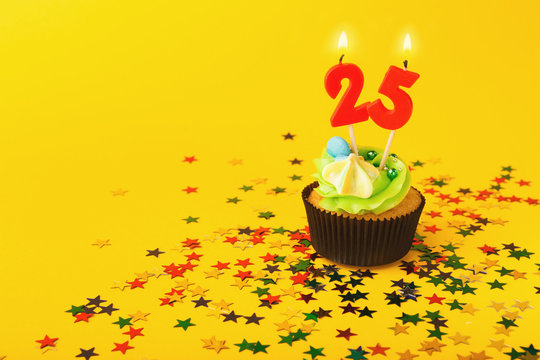 25th birthday cupcake with candle and sprinkles